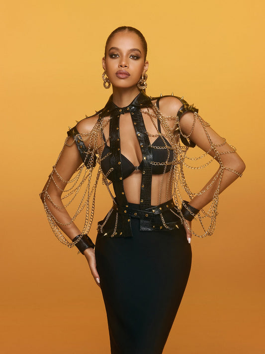 Top in pelle con catena e punte Renaud