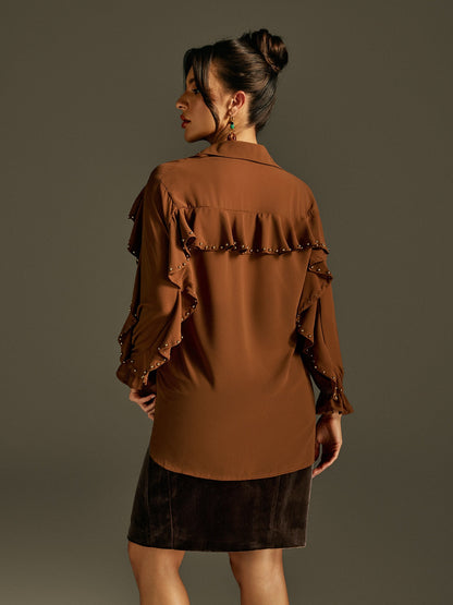 Top con maniche a campana e rouches Rogier