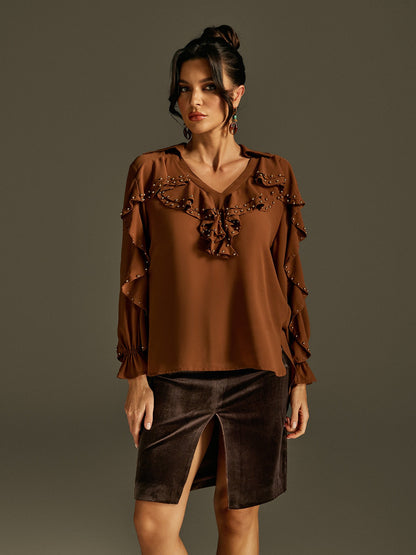 Top con maniche a campana e rouches Rogier