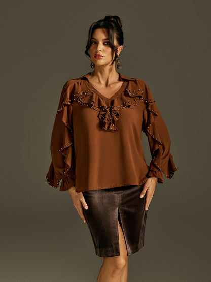 Top con maniche a campana e rouches Rogier