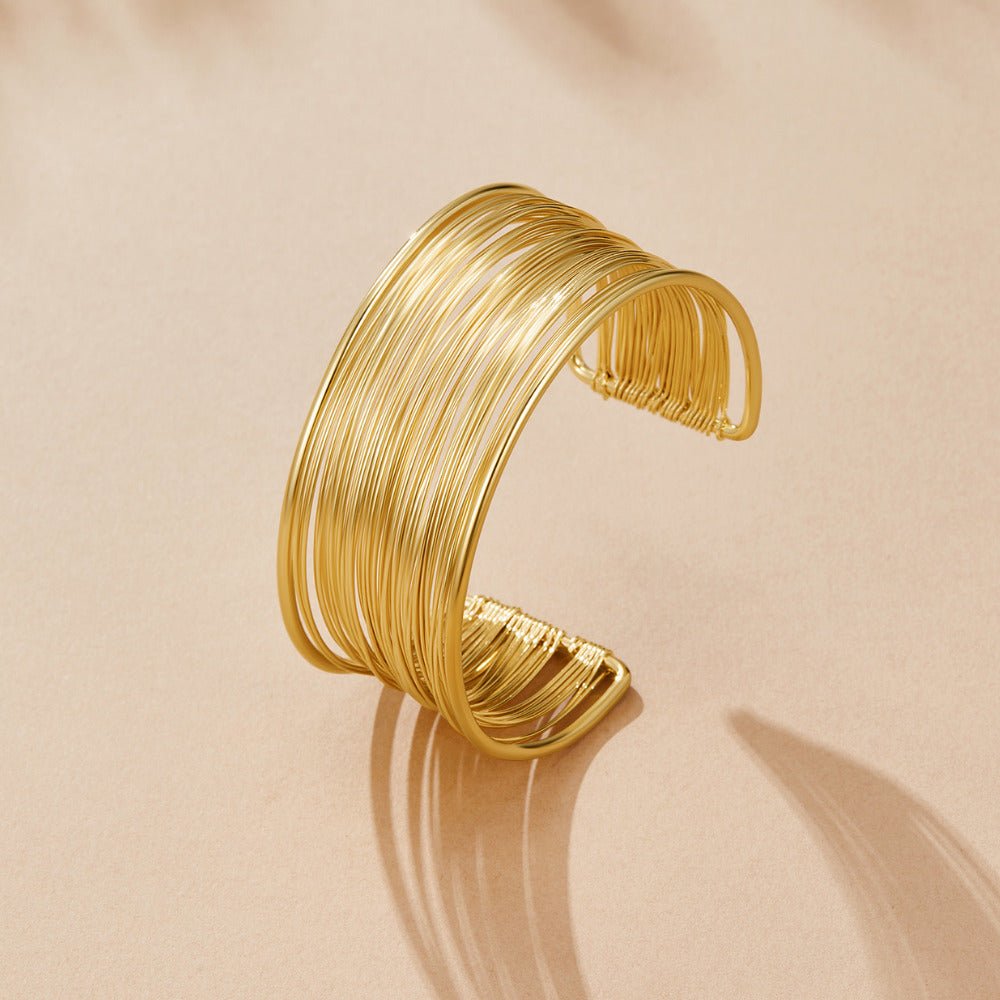 Bracciale largo in oro Leona