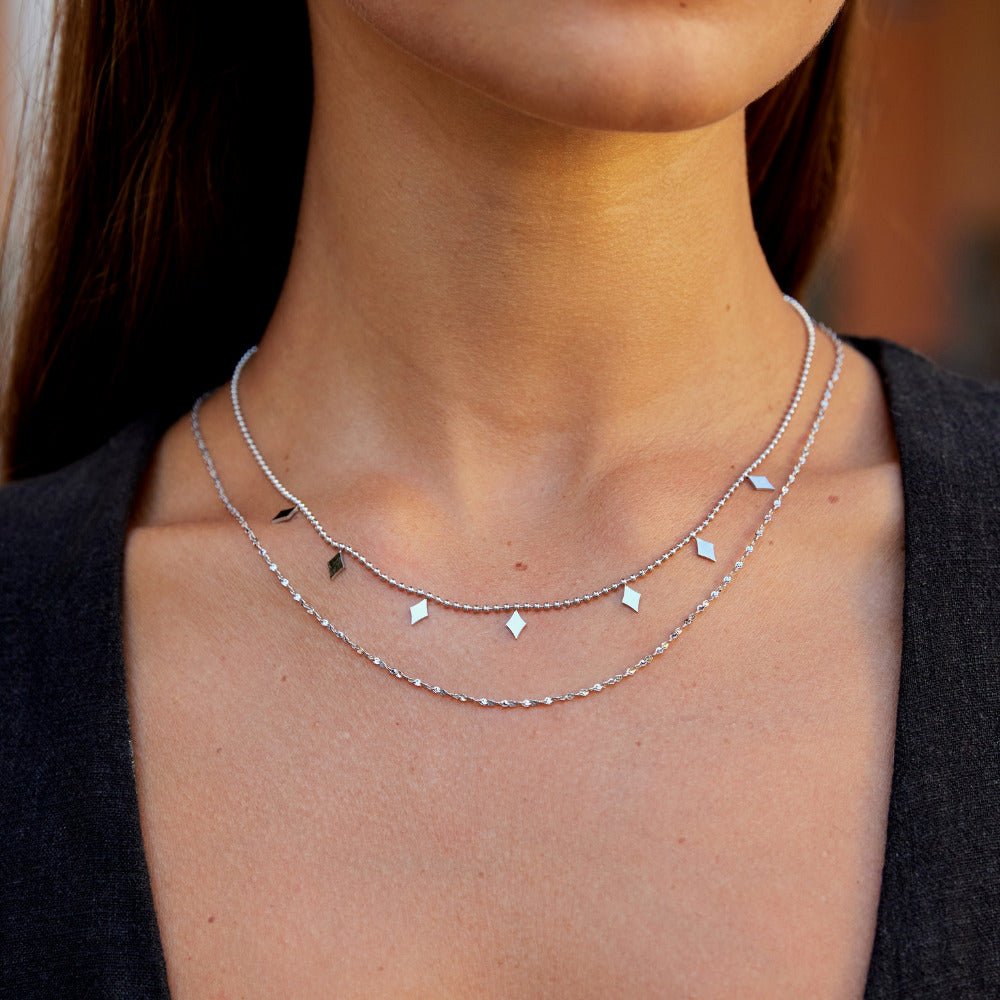 Collana a strati con goccia di diamante in salice