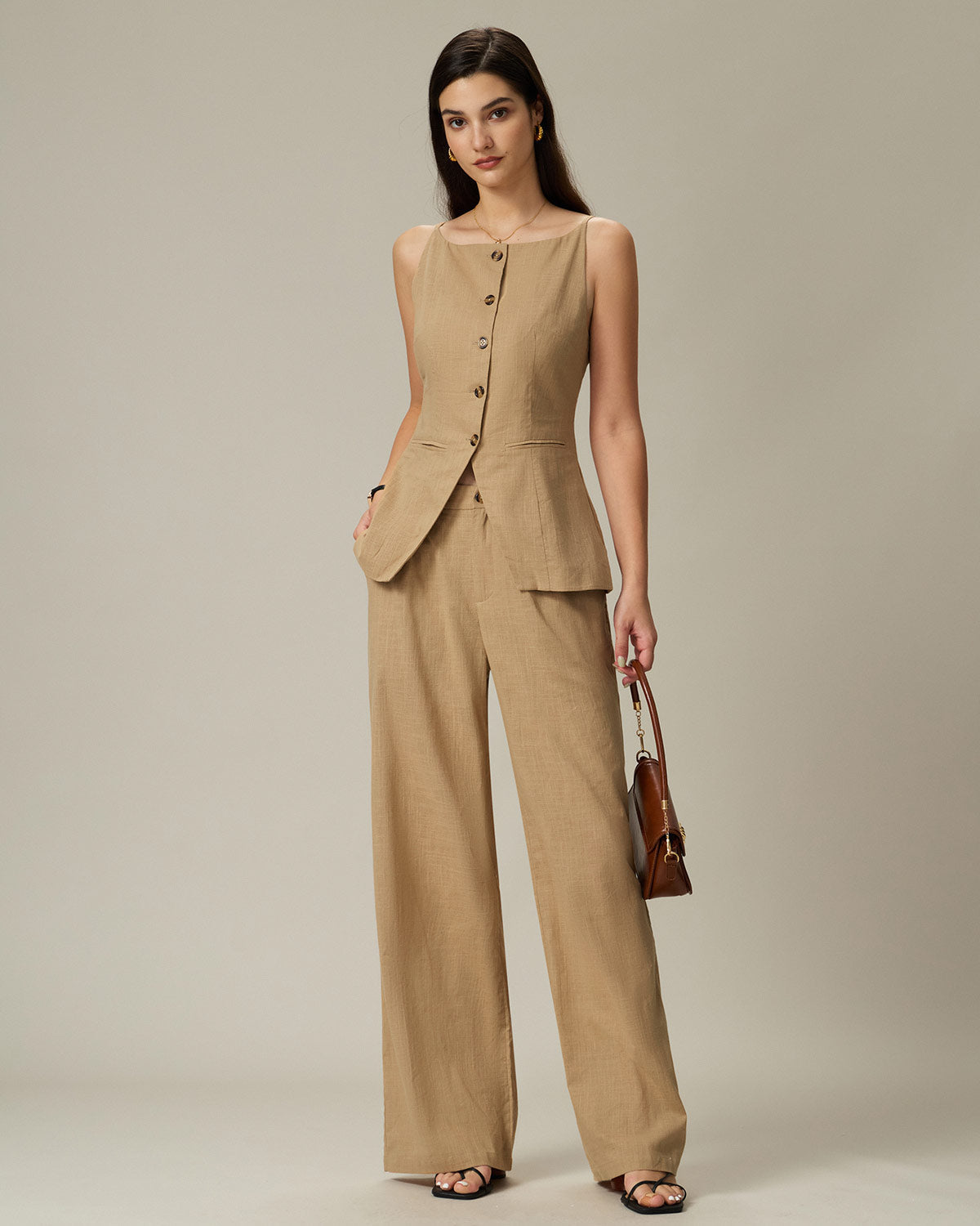 Pantaloni dritti con vita elastica e tasche marroni