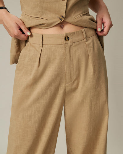 Pantaloni dritti con vita elastica e tasche marroni